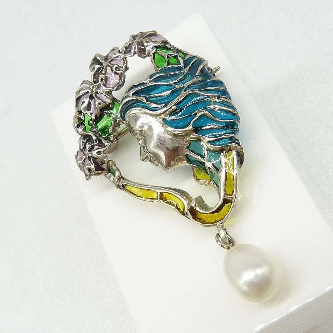 EXOTIC LADY PEARL BROOCH. — Brooches & Pendants — Rumsey’s Auctioneers