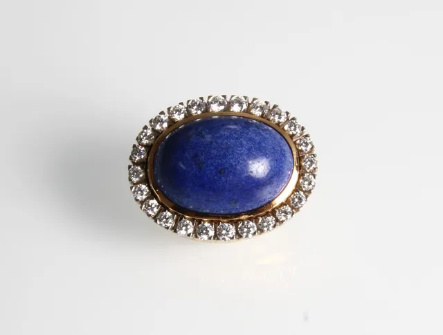Ole Lynggaard. 18 kt gold lock with 0.78 ct. diamonds for appraisal.