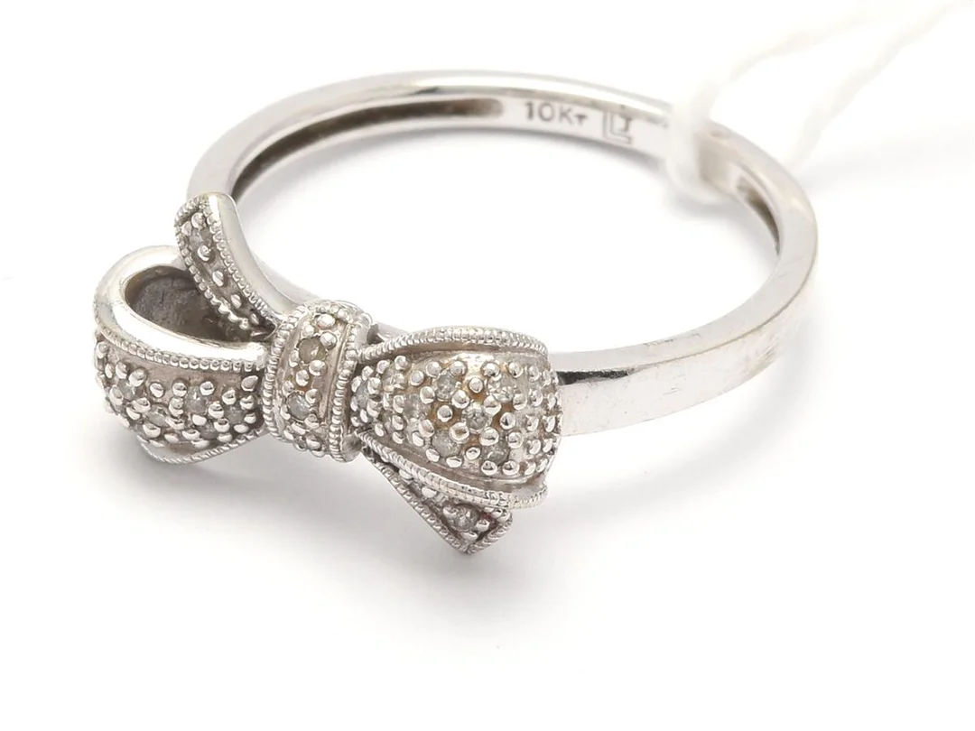 Ring 10K vitguld 2,6g Ø17¼med diamanter 23xca0,005ct — Smycken/Ring — Kaplans