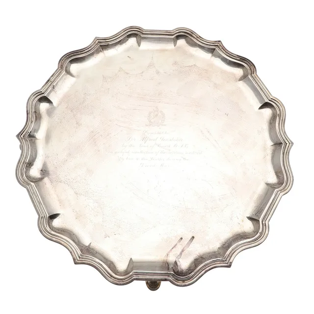 AN EARLY 20TH CENTURY SILVER SALVER.