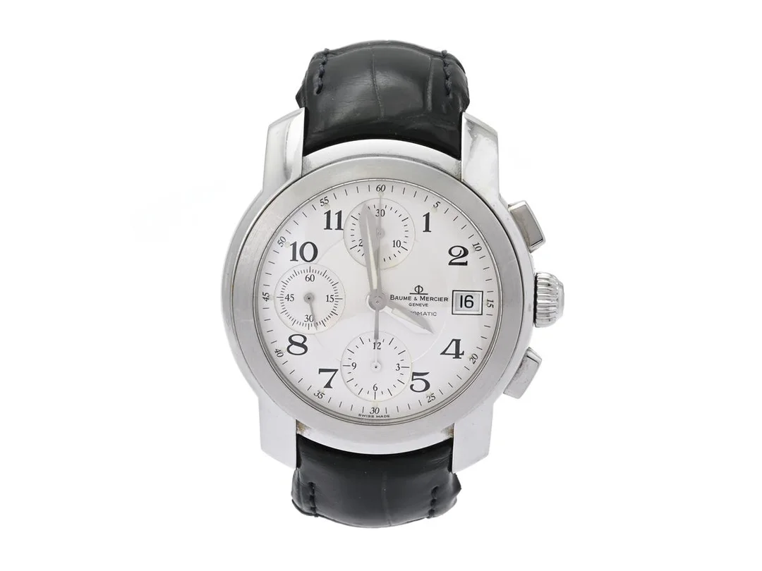 BAUME & MERCIER, Geneve, Capeland, Cal BM 13750 (ETA 7750), Serie nr. 5218816, Boett nr. MV045216, kronograf, herrur, 39 mm, stål, automatisk, safirglas, datum, skadad visare, läderband, viklås, ca 2002. — Klockor/Baume&Mer — Kaplans