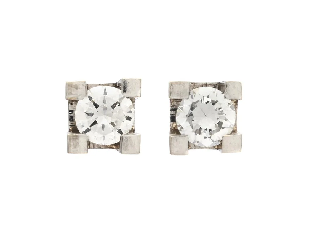 ÖRHÄNGEN, 18K vitguld, briljantslipade diamanter ca 0,32, ca TW/VS, stift, vikt 1,2 g, snurrebussar i sterlingsilver. — Smycken/Örhängen — Kaplans