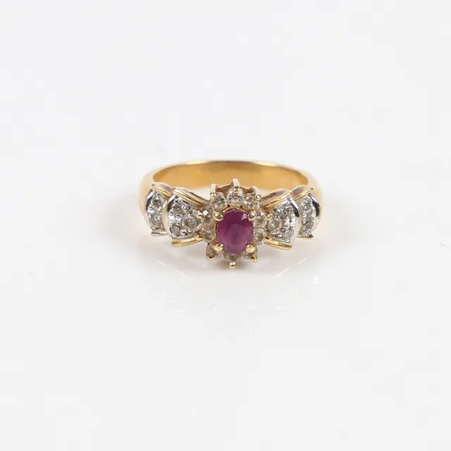 RUBY AND CZ CLUSTER RING.