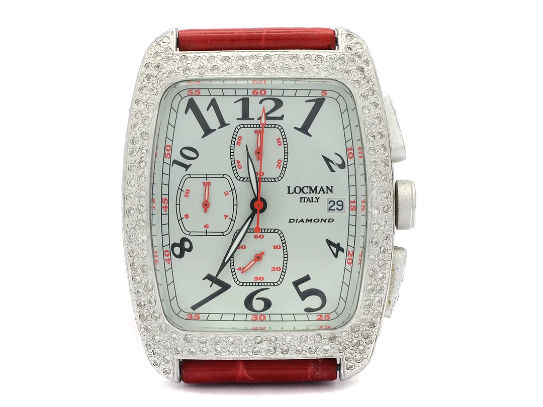 LOCMAN, Tonneau, "Full pavé", Serie nr. L0471, Ref nr. 487, kronograf, herrur, 32 x 37 (43) mm, aluminium, quartz, mineralglas, datum, skadad urtavla, briljanter på boetten (ca 180 st. CA-LB/VS, ca 2,00 ctv), läderband, originalspänne, ca 2003. — Klockor/Locman — Kaplans