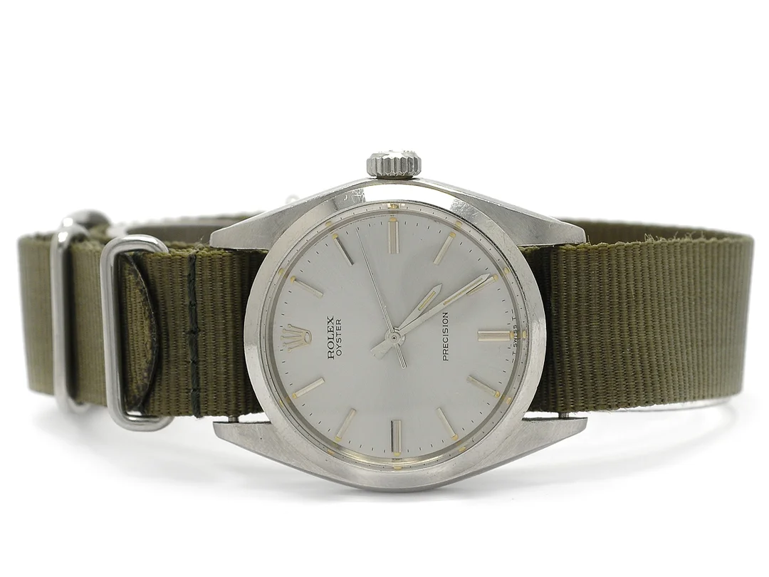 ROLEX, Oyster, Precision, Ref nr. 6426, Serie nr. 2651512, Cal 1225, Boett nr. 6426, herrur, 34,5 mm, stål, manuell, plexiglas, skadad urtavla, NATO-band, tillverkad fjärde kvartalet 1970. — Klockor/Rolex — Kaplans