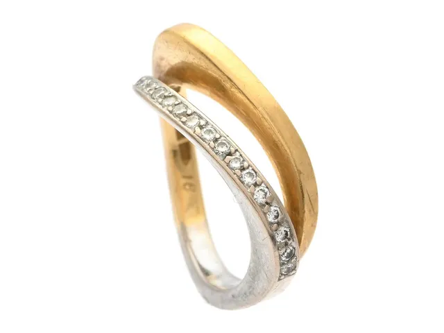 ENGELBERT, ring, 18K vitguld/guld, briljantslipade diamanter ca 0,16 ctv, ca TW/VS, stl 17,25 mm, vikt 8,2 g, slitage.