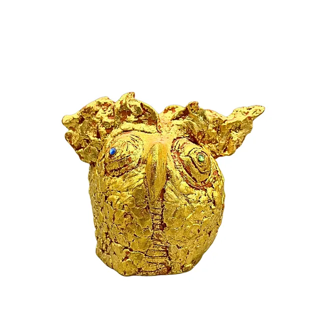 ABSTRAKTE EULENSKULPTUR AUS GETÖPFERTEM UND VERGOLDETEM TON.