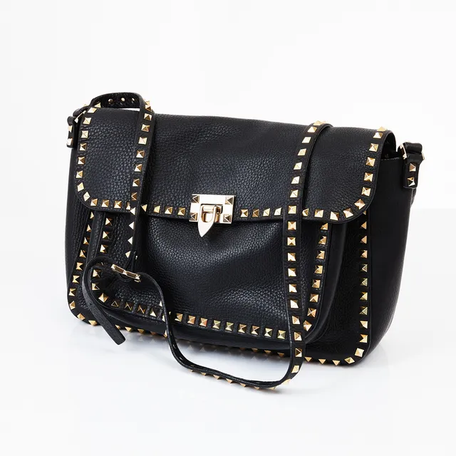 VALENTINO, "Rockstud", axelbandsväska med nitar i gulmetall, fodrad med mocka, två större fack invändigt samt tre mindre fack varav ett med dragkedja, märkt VALENTINO GARAVANI, made in Italy.