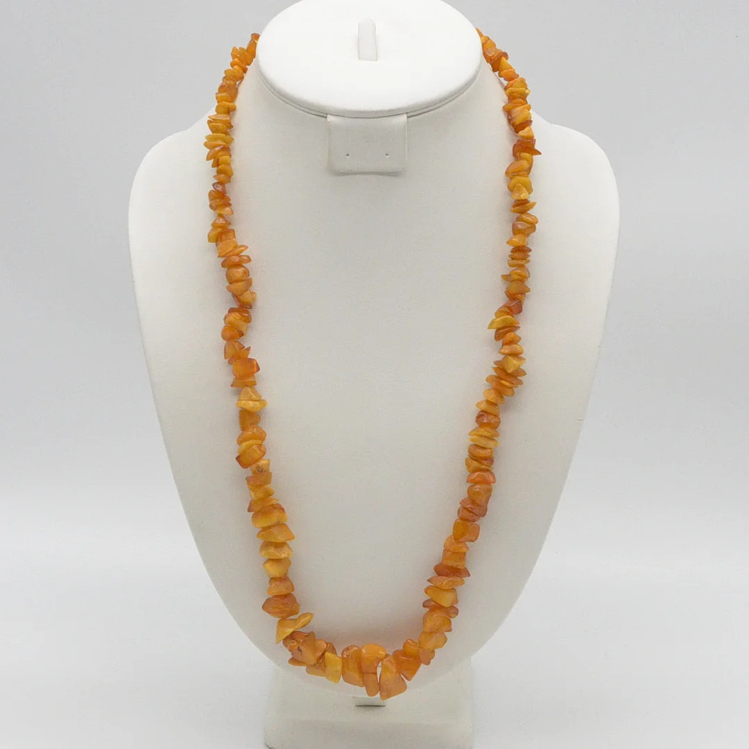 EDELSTEINCOLLIER AUS BUTTERSCOTCH-BERNSTEIN, NATURBELASSENE FORM, POLIERTE OBERFLÄCHE, NACH GRÖSSE GEORDNET, VINTAGE, CA. 70 CM. — Necklace — Kunst- und Auktionshaus Kleinhenz
