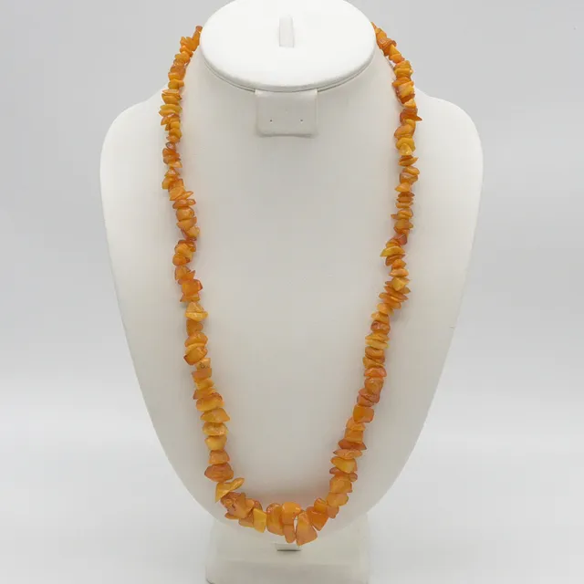 EDELSTEINCOLLIER AUS BUTTERSCOTCH-BERNSTEIN, NATURBELASSENE FORM, POLIERTE OBERFLÄCHE, NACH GRÖSSE GEORDNET, VINTAGE, CA. 70 CM.