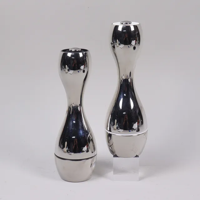 CONSTANTIN WORTMANN. för Georg Jensen, "Cobra", salt -/pepparkvarnar, 1 par.