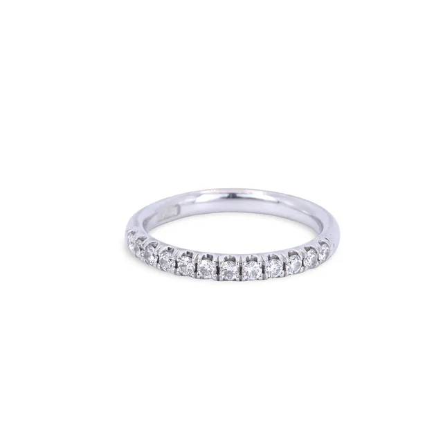 PLATINUM DIAMOND HALF ETERNITY RING.