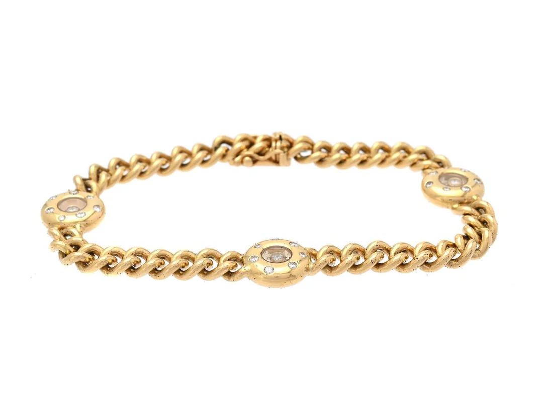 CHOPARD, armband, Happy Diamonds, ref nr 9152927, 18K guld, briljantslipade diamanter ca 0,50 ctv, ca TW/VS, längd 19 cm, vikt 36,4 g, originaletui och certifikat. — Smycken/Armband — Kaplans