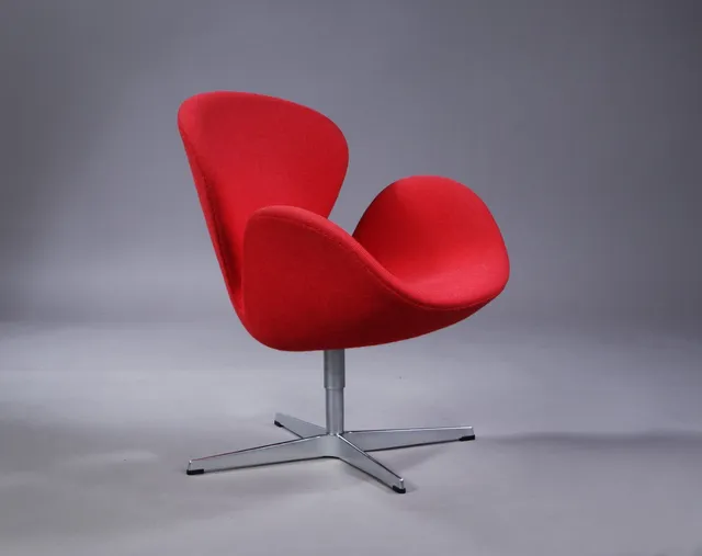 Arne Jacobsen. Lounge chair 'The Swan', return swivel, model 3320, Brown label 2012, red 'Hallingdal'.