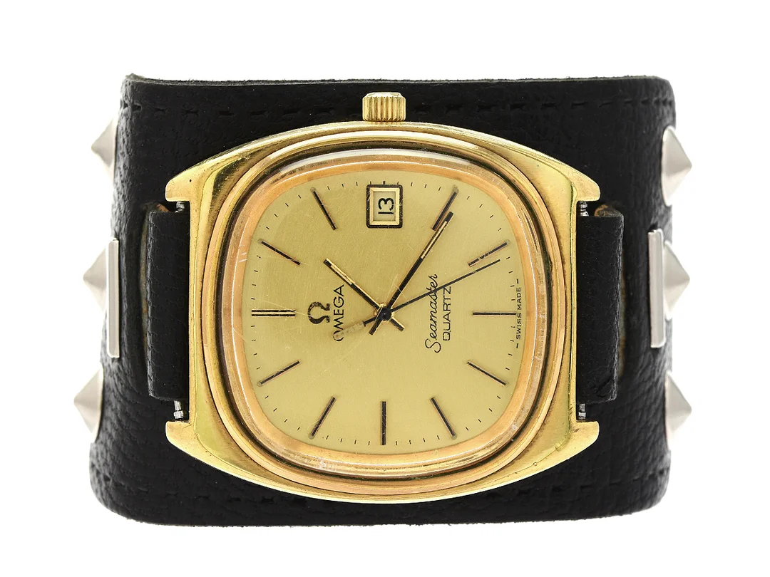OMEGA, Seamaster, Cal 1342, Serie nr. 40736714, Ref nr. MD 196.0081, Boett nr. 196.0081, herrur, 35 mm, doublé (20 micron), quartz, plexiglas, datum, skadad urtavla, defekt, skadad boett, läderband, ca 1977. — Klockor/Omega — Kaplans