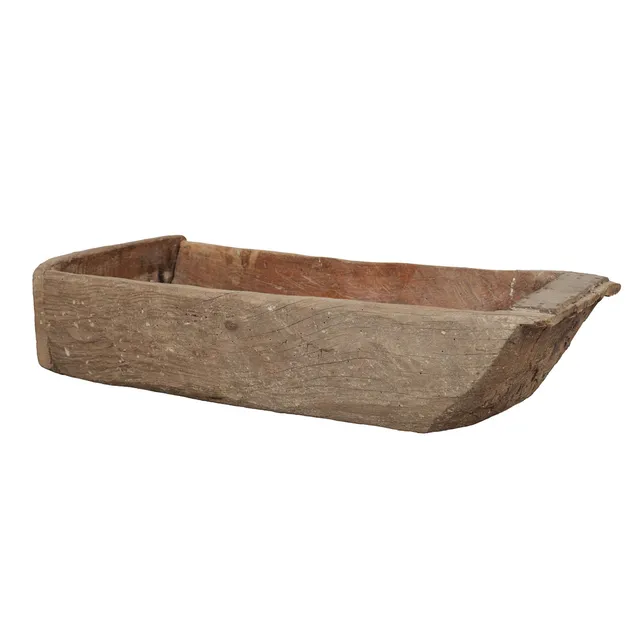 A 19TH CENTURY PRIMITIVE DUG OUT BOWL.