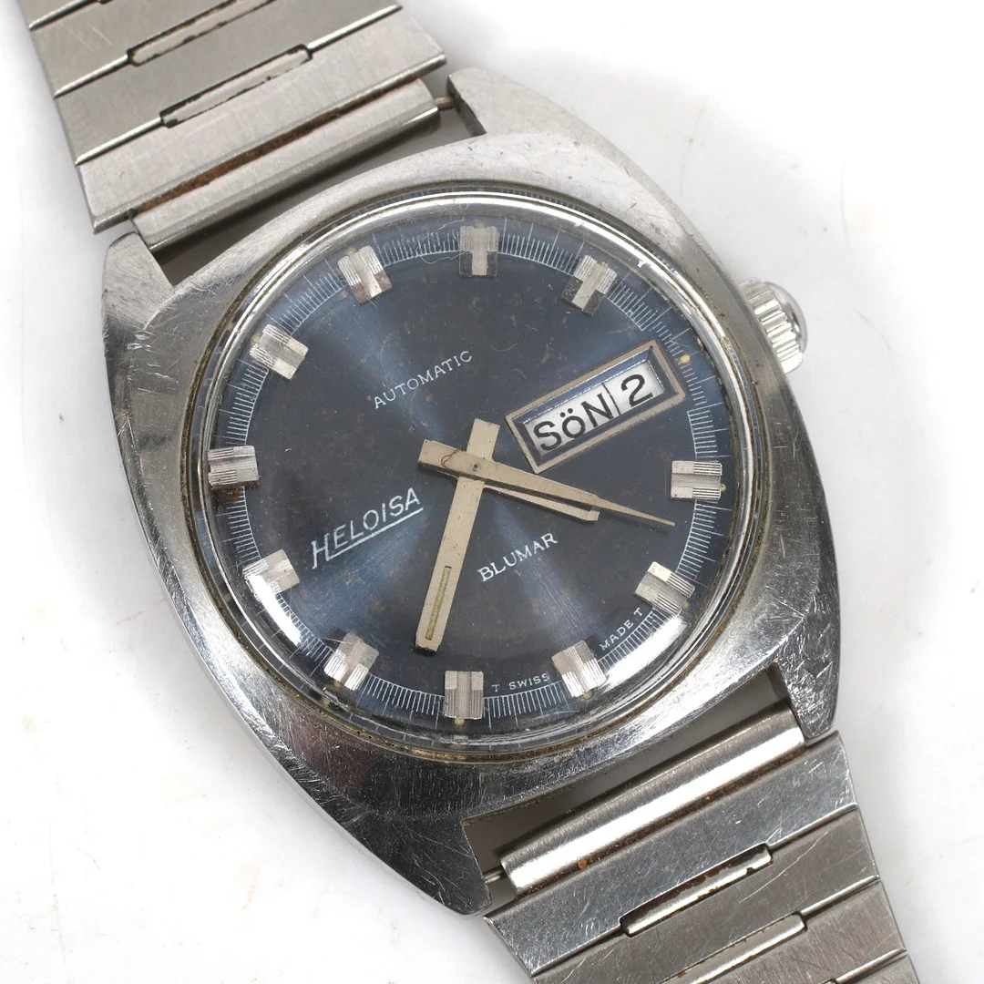 ARMBANDSUR, stål, plexiglas, dag/datum, Heloisa Blumar Automatic, cal. ETA 2789. 1970-tal. — Wristwatches — Stadsauktion Sundsvall