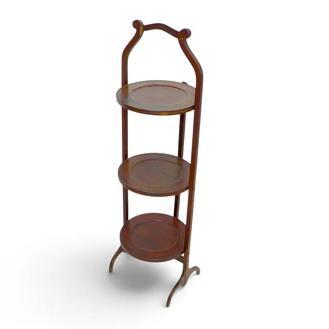 A THREE TIER FOLDING MAHOGANY CAKE STAND / TABLE.