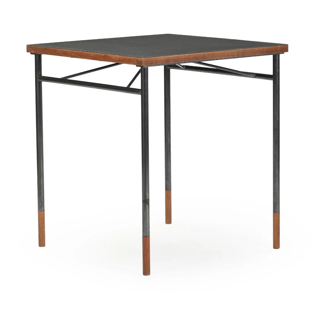Square table with steel frame. Walnut wood “Shoes” and top edge. Top with black linoleum. Manufactured and marked by Onecollection, House of Finn Juhl. H. 72 cm. L. 65. W. 65 cm. — Modern Furniture — Bruun Rasmussen