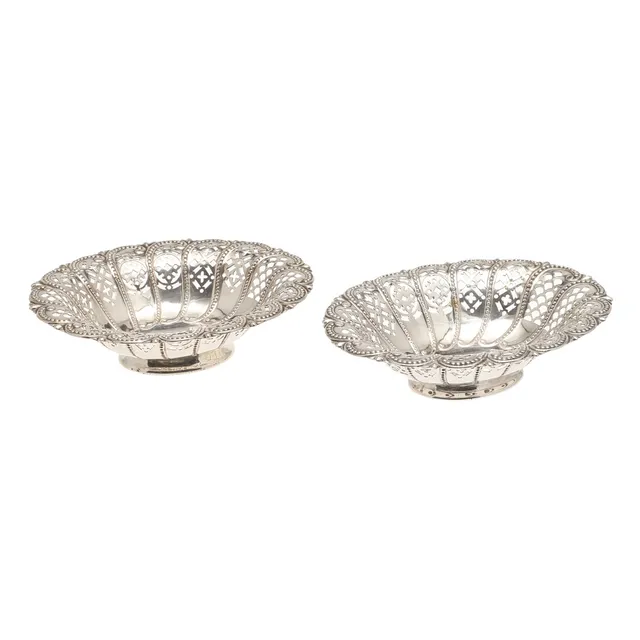 A PAIR OF LATE VICTORIAN SILVER BON BON DISHES.