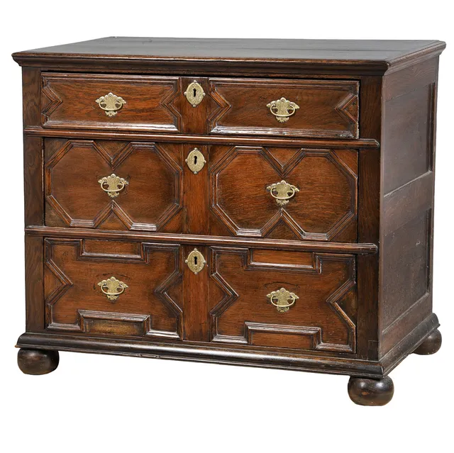 A CHARLES II OAK GEOMETRIC CHEST OF DRAWERS, CIRCA 1680.