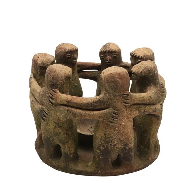 A TERRACOTTA FIGURAL SCULPTURE.