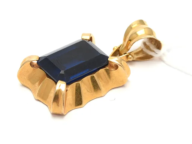 Hänge 18K 8,1g 3,2x1,5cm med blå sten
