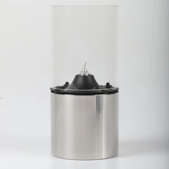 ERIK MAGNUSSEN. Oljelampa, rostfritt stål/glas, Stelton.