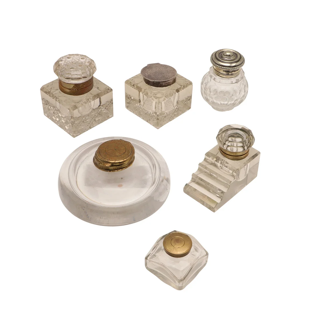 A QUANTITY OF 20TH CENTURY SILVER AND PLATED CUT GLASS INKWELLS. — Silver plated — Lawrences Auctioneers