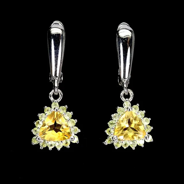 Earrings in rhodium-plated sterling silver with citrines and peridots.