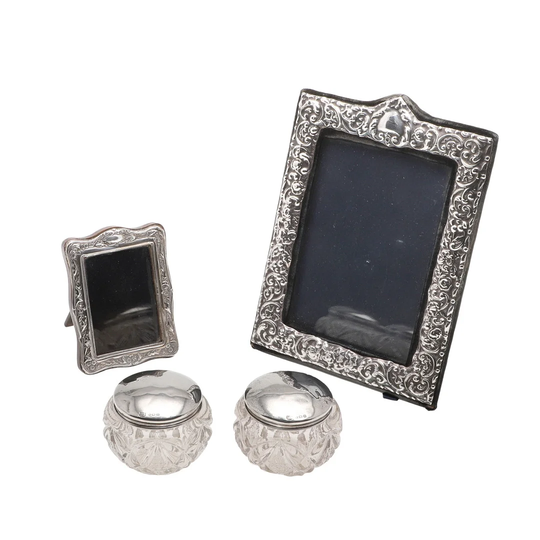 SILVER PHOTOGRAPH FRAMES & LIDDED DRESSING. — Other metals — Lawrences Auctioneers