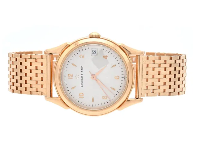 Eterna-Matic 1948, datum, manuell, boettnr: C445, 8400.69, med korridorlänk i 18K. Brv 86g.