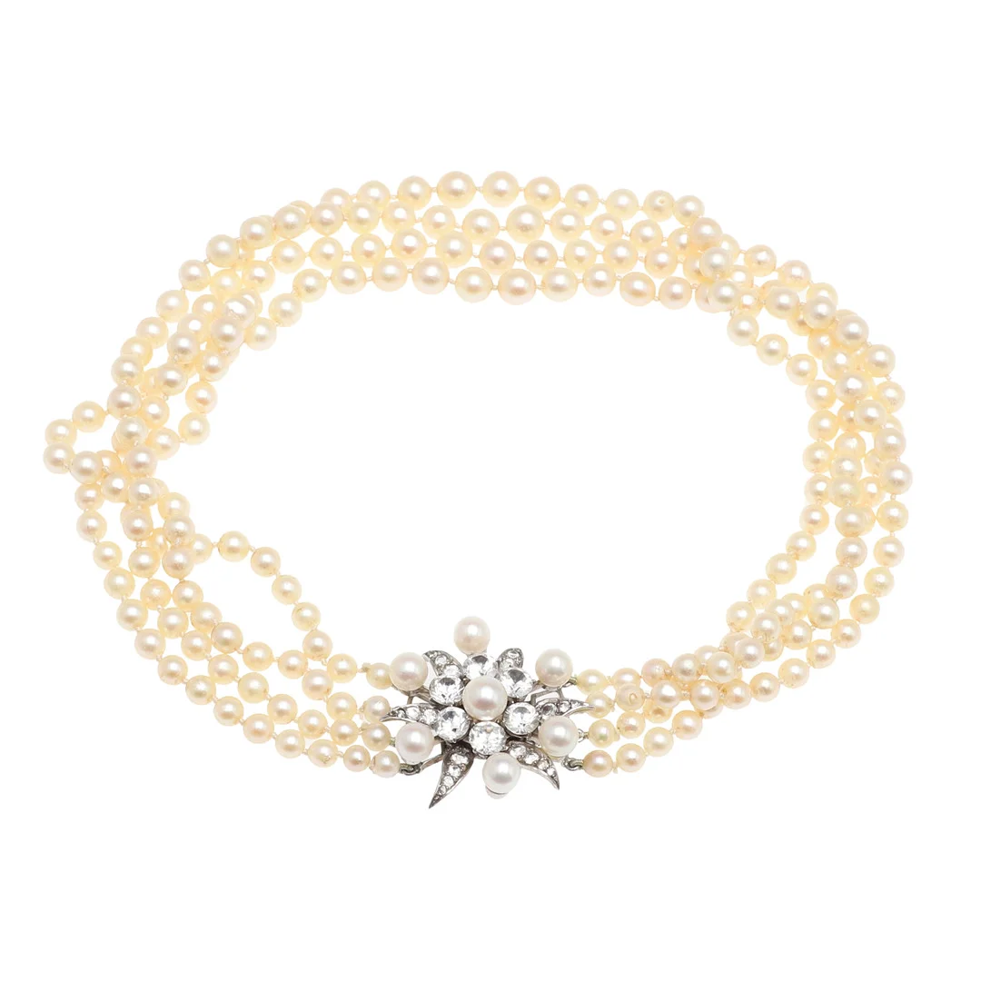 A FOUR STRAND CULTURED PEARL CHOKER WITH PASTE SET CLASP. — Necklace — Lawrences Auctioneers