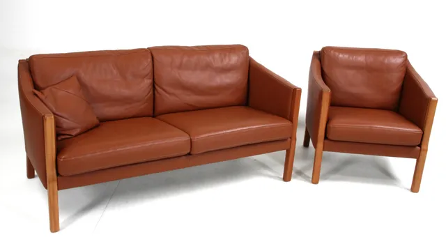 Henning Jensen. Two-seater sofa and armchair, cognac-colored leather (2)