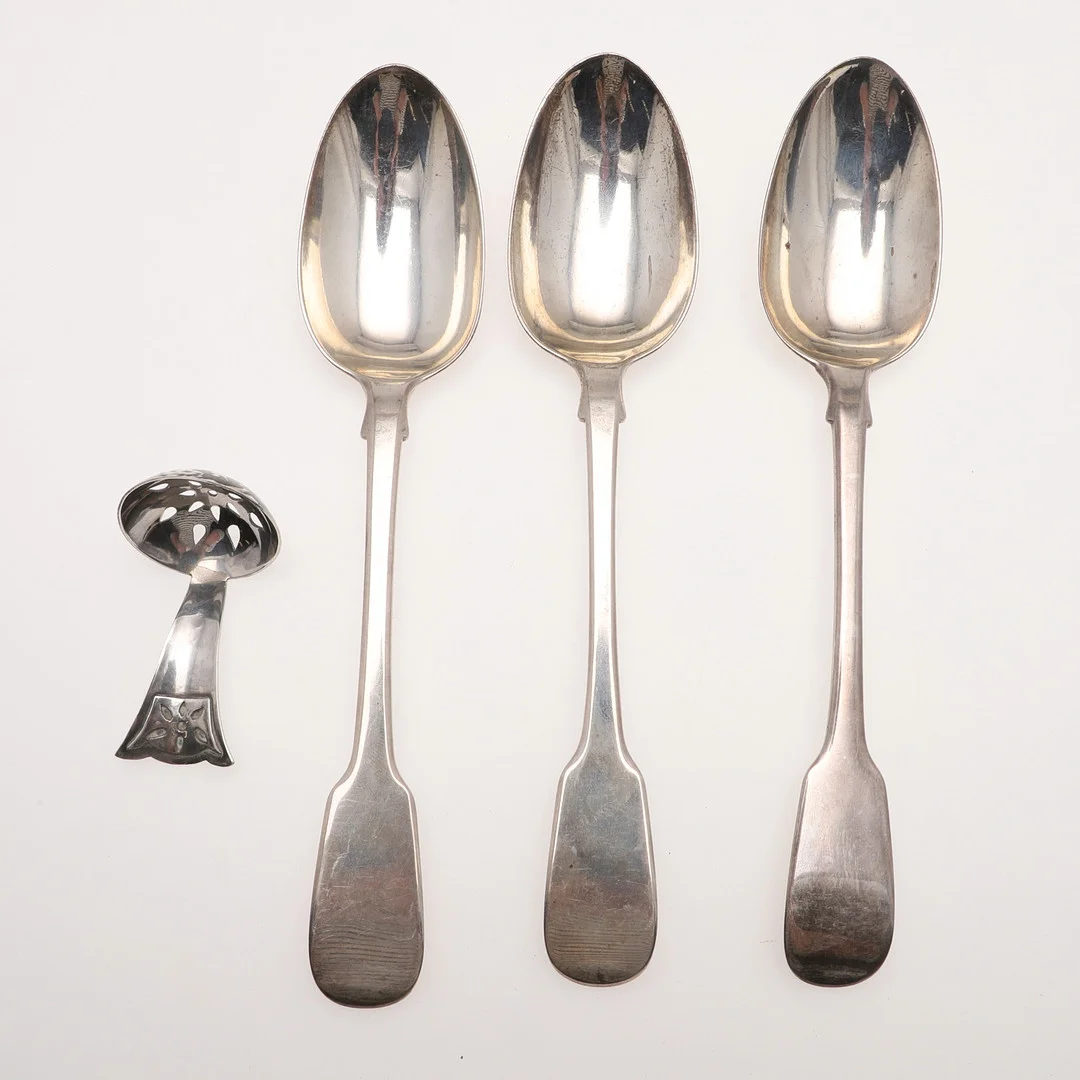 THREE EARLY 19TH CENTURY SILVER TABLE SPOONS AND A SILVER SIFTING SPOON. — Silver — Lawrences Auctioneers