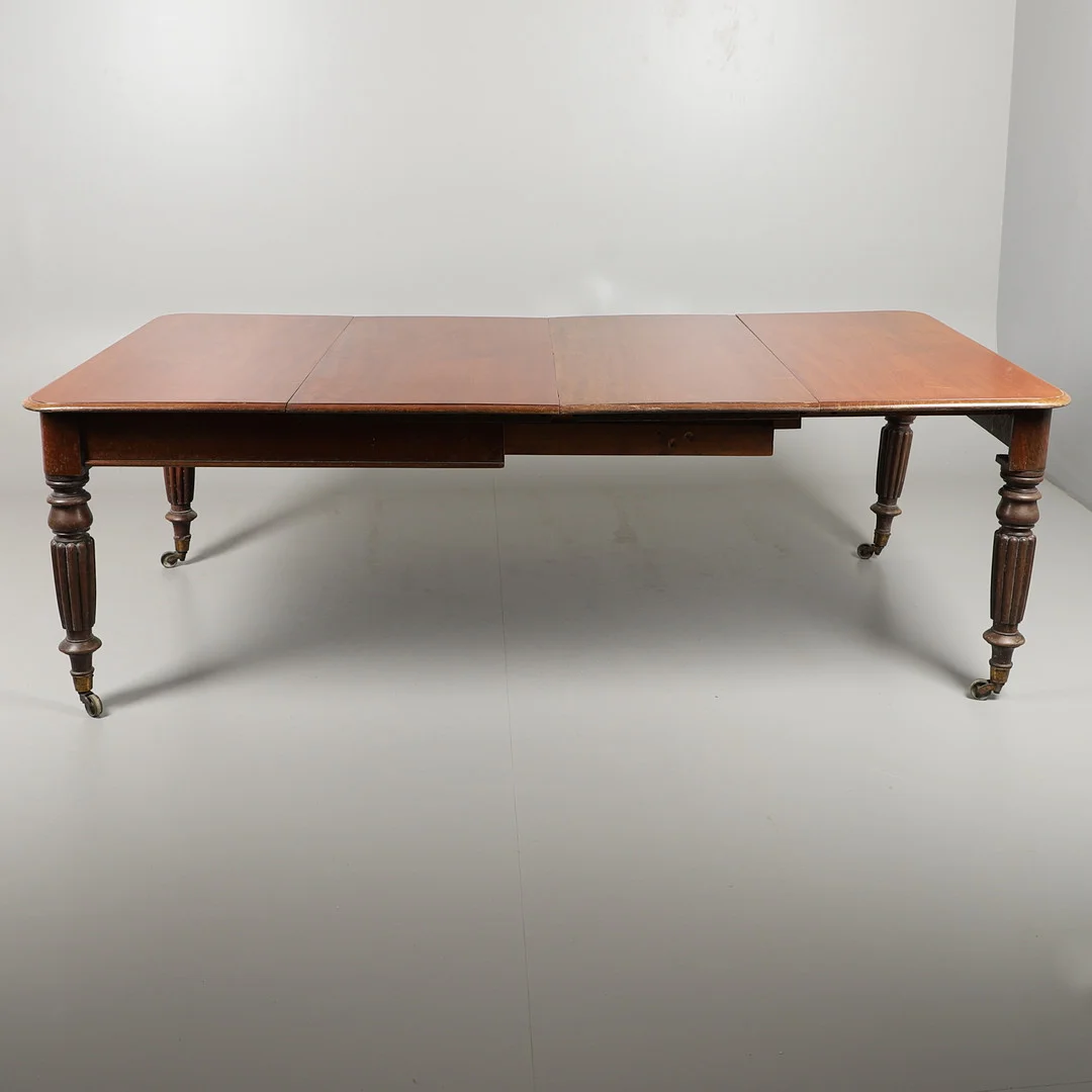 A VICTORIAN MAHOGANY EXTENDING DINING TABLE. — Tables — Lawrences Auctioneers