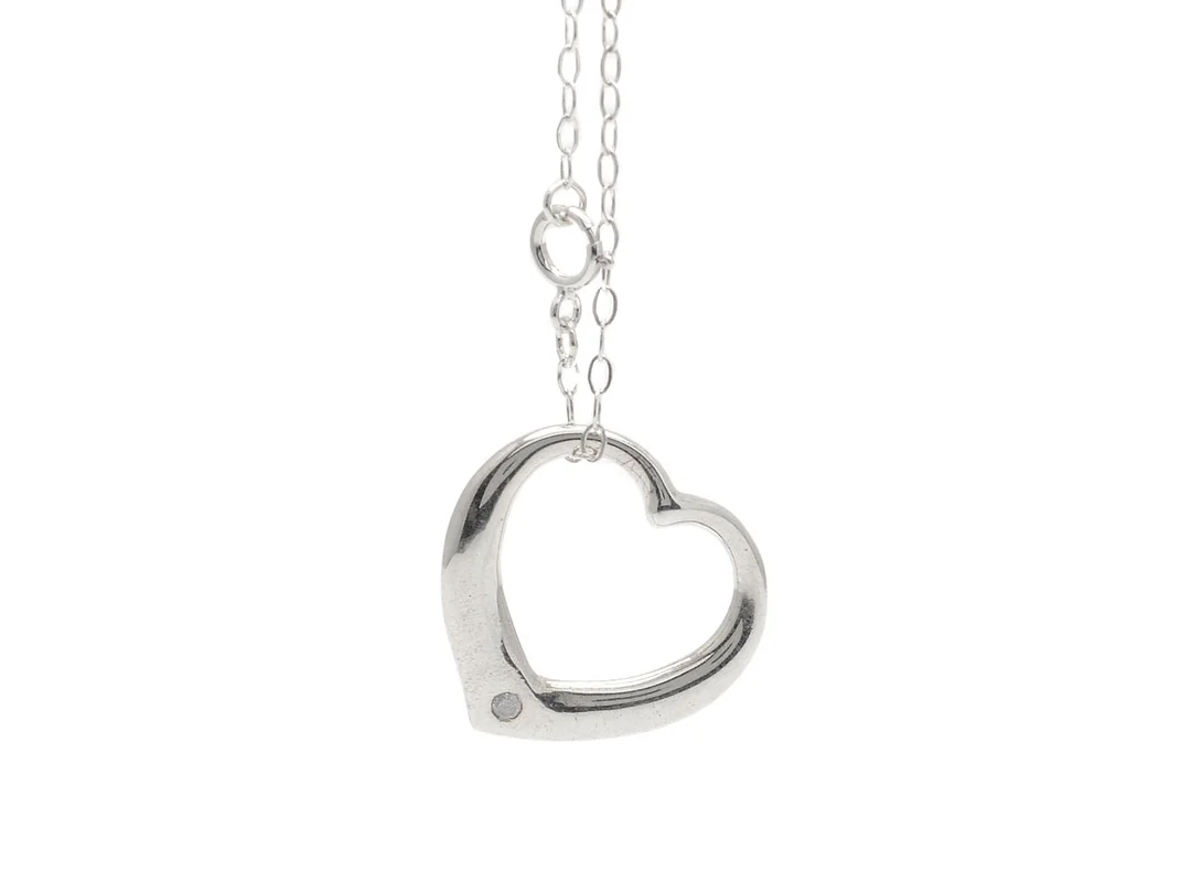 KEDJA/HÄNGE, sterlingsilver, åttkantslipad diamant ca 0,02 ct, ca W/P1, längd 46 cm, vikt 3,0 g. — Smycken/Hänge med kedja — Kaplans