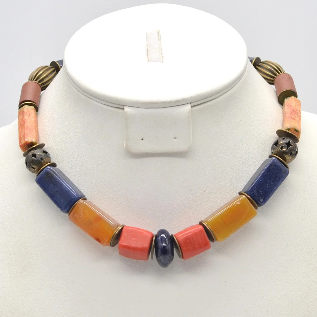 EDELSTEINMIXCOLLIER, POLIERTE PERLEN, MESSINGELEMENTE, SPÄTES 20. JAHRHUNDERT. — Necklace — Kunst- und Auktionshaus Kleinhenz
