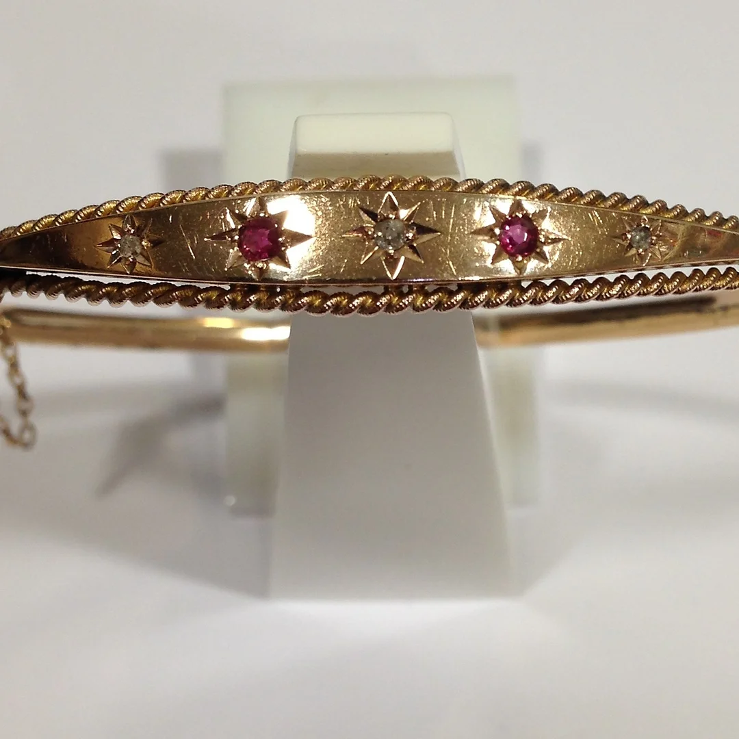 VICTORIAN RUBY AND DIAMOND BANGLE. — Bracelets — Rumsey’s Auctioneers