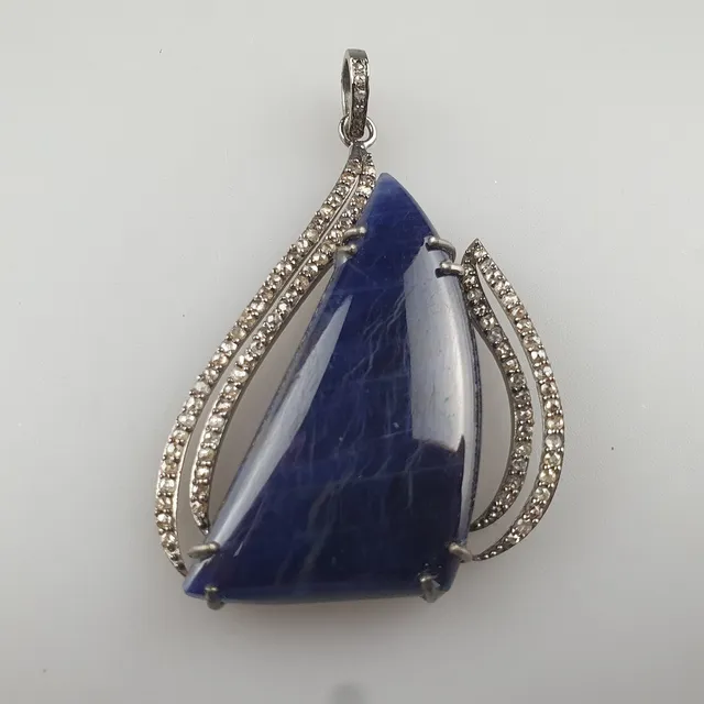 - Blue Sapphire Pendant with Diamond Accents, 925 Silver.