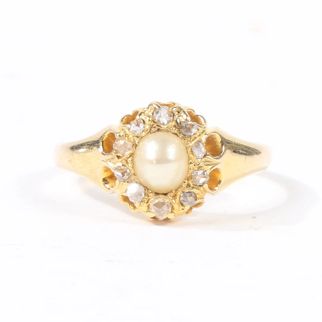 AN 18 CARAT GOLD DIAMOND AND PEARL RING. — Rings — Bishop & Miller