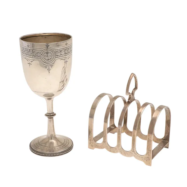 A VICTORIAN SILVER GOBLET AND A LATER SILVER TOAST RACK.