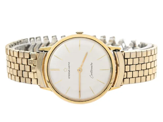 ETERNA-MATIC, Centenaire, Cal 1429U, Serie nr. 4458159, Boett nr. 4392689, herrur, 34,5 mm, doublé (80 micron), automatisk, plexiglas, servicebehov, ca 1960, länk i gulmetall ej original (skadad).