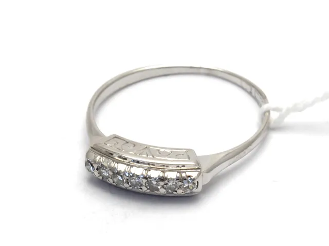 Ring vitguld 18K 2,4g Ø17¼ med åttkantslipade diamanter 7xca.0,02ct