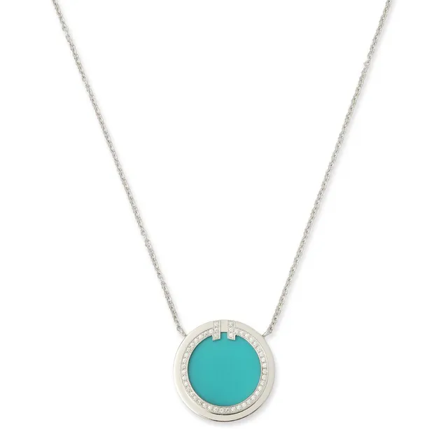 Tiffany & Co.: A “T Circle” necklace set with a turquoise and diamond pendant, mounted in 18k white gold. L. 40.5–45.5 cm.