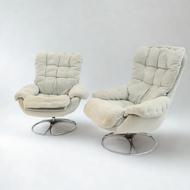 FÅTÖLJER ETT PAR, 1970-tal, grå textil klädsel, kromad fot, snurrbara. Löstagbara dynor.