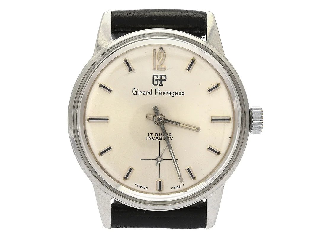 GIRARD-PERREGAUX, "Incablock", herrur, 34,5 mm, Boett nr. 16260, stål, manuell, plexiglas, liten sekundvisare (utbytt/skadad), renoverad/utbytt urtavla, skadad urtavla, läderband, ca 1960, box. — Klockor/Girard-Perregaux — Kaplans