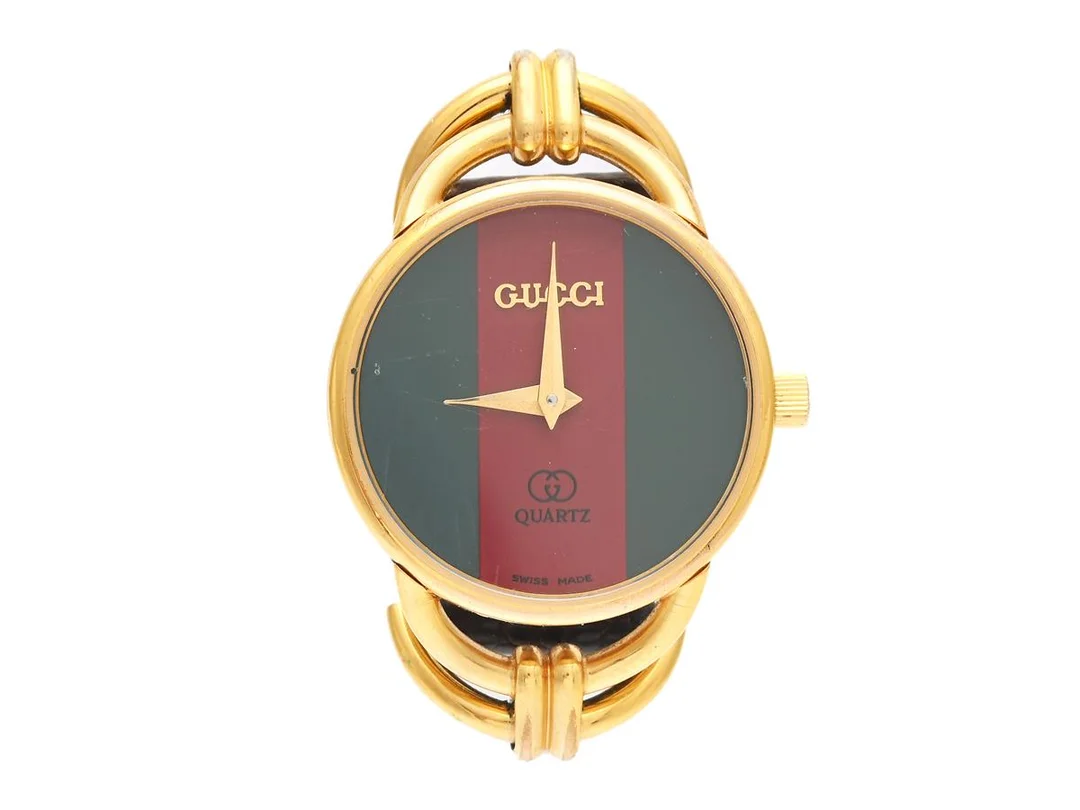 GUCCI, damur, 23 mm, Ref nr. 6000L, Serie nr. 061-609, doublé (10 micron), quartz, mineralglas, defekt (går ej), läderband, originalspänne, ca 1987. — Klockor/Gucci — Kaplans