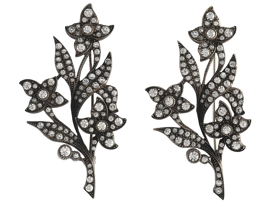 BROSCHER, 2 st, silver, paste, stl 65 x 35 mm, vikt 29,4 g, några med nagg och skador. — Smycken/Brosch — Kaplans