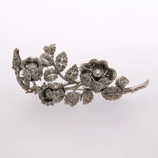 Diamonds floral brooch, mid 20th Century.